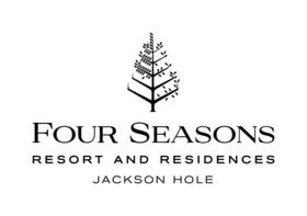 Logo of four seasons resort and residences jackson hole featuring a stylized tree graphic above the text.