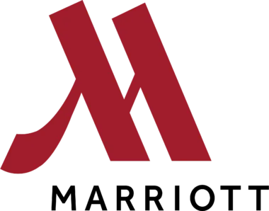 The image displays a large, red stylized letter 'n' with a distinct angular design on a black background.