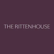 Logo of "the rittenhouse" in white text on a dark purple background.