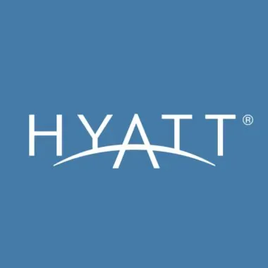 The logo of hyatt hotels corporation, featuring the word "hyatt" in white uppercase letters with a curved line underneath, set against a solid blue background.