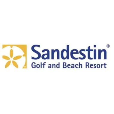 Logo of sandestin golf and beach resort featuring a stylized yellow sunflower next to blue text.